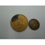Two tokens - One 1850 'Keep your temper' and the other 1960 Trustee savings bank token