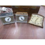 A vintage clock and 2 retro alarm clocks