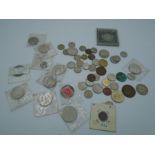 A blue box - mixed lot of mostly 'silver' foreign coins including some early dates