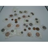 A mixed lot of mainly copper and bronze coins, including Fathings, 1878 and ?, 1673, 1835, etc...