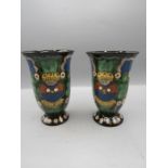 A pair of Halini pottery vases15cm tall