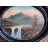 2 signed oriental waterfall scenes in oval frames possibly Victorian