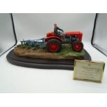 Country Artists 'Breaking New Ground' by Carl Reid Sefton, farmer driving tractor on wood plinth,