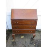 A veneered bureau