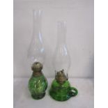 2 vintage oil lamps with green glass bases
