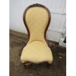 An upholstered bedroom chair