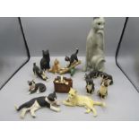 A collection of cat figurines