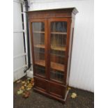 Glazed mahogany bookcase with cupboard to base H192cm W95cm D39cm approx