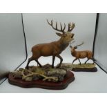 2 Border Fine Arts Stags on wood plinths, 'Highland Majesty' B0220 37cm long and 31cm tall and