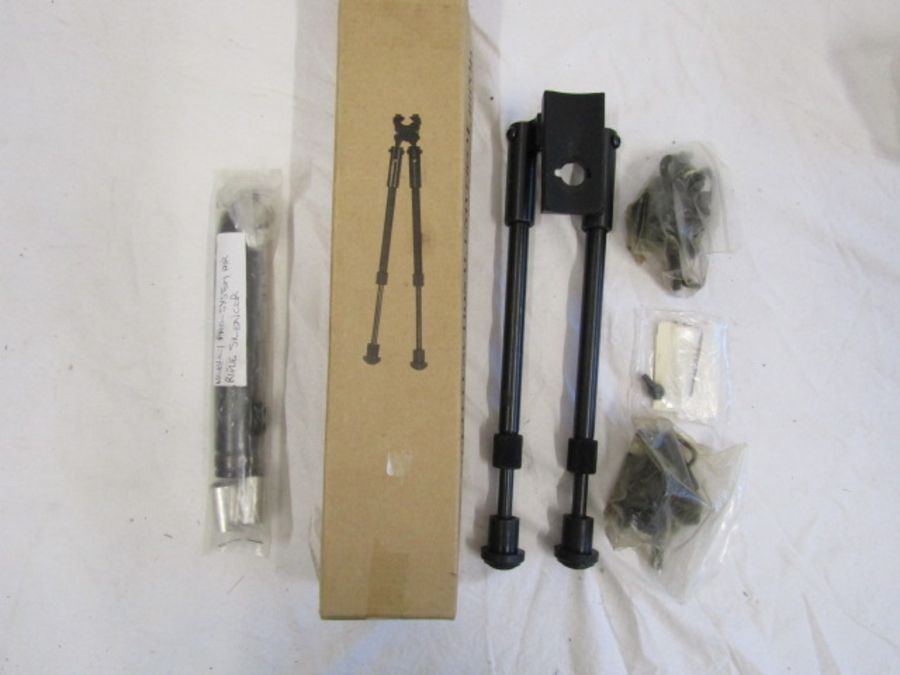 one bi-pod stand in box and one Webley pro-system air rifle silencer
