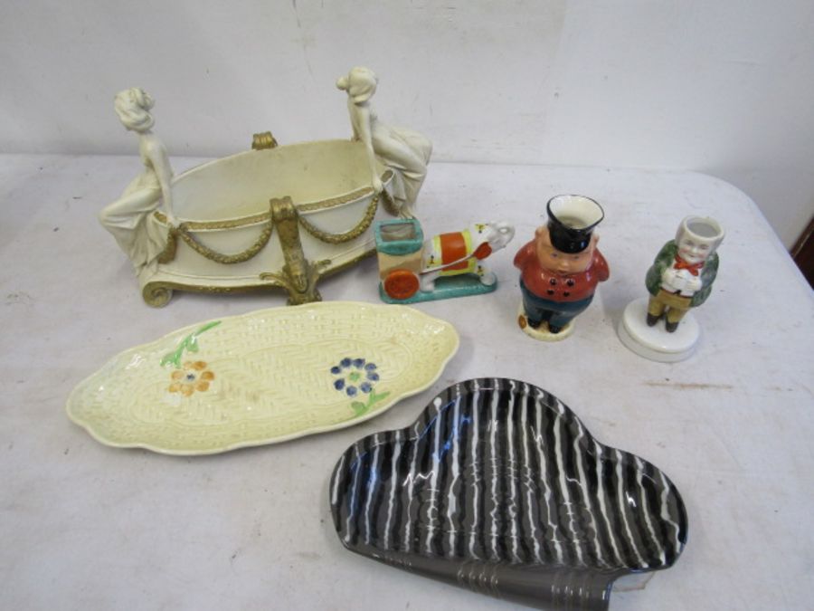 A Beswick dish, elephant spill vase, mini toby jugs and a cucumber plate (cracked) and a cream and