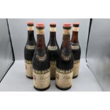 Five bottles of Borgogno Barolo to include two 1964, one 1980, one 1979 and one 1981