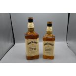 Two bottles of Jack Daniels Tennessee Honey 70cl and one 1litre