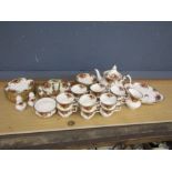 Royal Albert Country Roses part tea set comprising 12 cups and saucers, teapot, milk jug, salt and