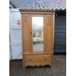 A wardrobe with drawer to base and central mirror- comes in 3 pieces