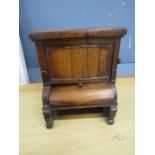 An apprentice piece- a drum bureau bookcase made of various hardwoods