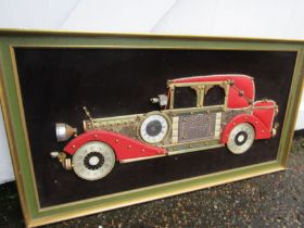 G. Burgess of London original metallic collage of a classic car made with various metal pieces
