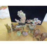 A Jade blossom tree, onyx/ soapstone items and treen elephants etc