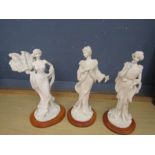 3 Resin statues of ladies on wooden bases H34cm approx