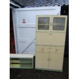 A retro kitchen pantry cupboard with a matching wall unit