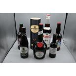 Collection of 7 different spirits and beers to include pimms and more