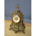 Ornate brass mantel clock H 24cm approx