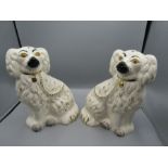 A pair of Beswick mantel dogs in white and gilt 26cmH