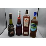 Four bottles of mixed liqueur