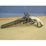 A decorative replica flintlock pistol