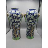 A pair of Oriental blossom tree vases with elephant handles 36cm tall