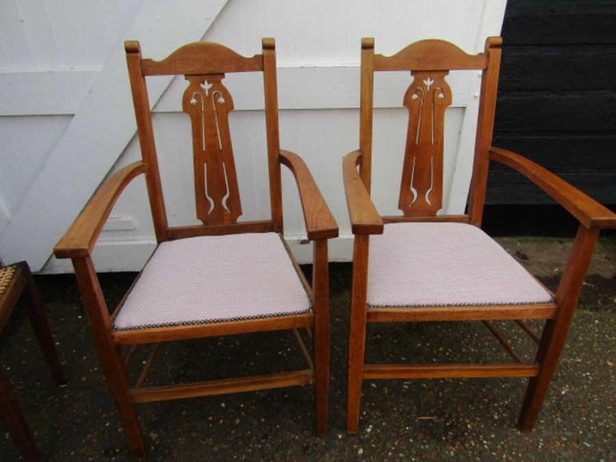 Pair of Arts and Craft chairs with clean neutral seat pads