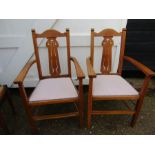 Pair of Arts and Craft chairs with clean neutral seat pads