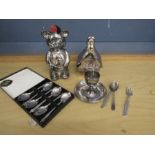Silver plate Snoopy money box, bear money box, cigar cutters, teaspoon set, egg cup and flatware