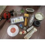 Collectors lot to include vintage perfume bottles, bank, silver mother of pearl brush a/f bone