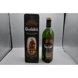 Bottle of Glenfiddich Pure Malt with the Clan tin 'house of Stewart'