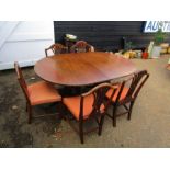 Mahogany extending dining table with 5 upholstered chairs