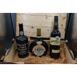 Wooden crate to include Rocha's 1995 Colheita port, Casco De Le Cruz sherry, 1990 Armagnac Trianon