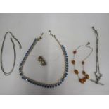 Amber necklace, a silver necklace and costume jewellery