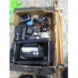 A box camera's, video recorder, lens etc plus an easel