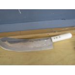 A large butchers knife