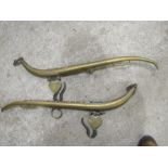 A pair of brass horse haines