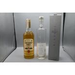 Two bottles to include Tariquet blanche Armangac (boxed) and Bacardi rum