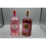 Two bottles of Haysmiths gin one Raspberry and redcurrant pink gin, and one Mulled winterberry gin