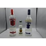 2 Bottles and one small bottle of vodka to include one Smirnoff triple distiller 1l, one Smirnoff