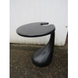 A retro black plastic table