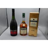 Two bottles of brandy to include remy Martin fine champagne cognac and three barrels rare old French