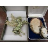 2 cameo brooches and Kirk & Folley Pegasus brooch