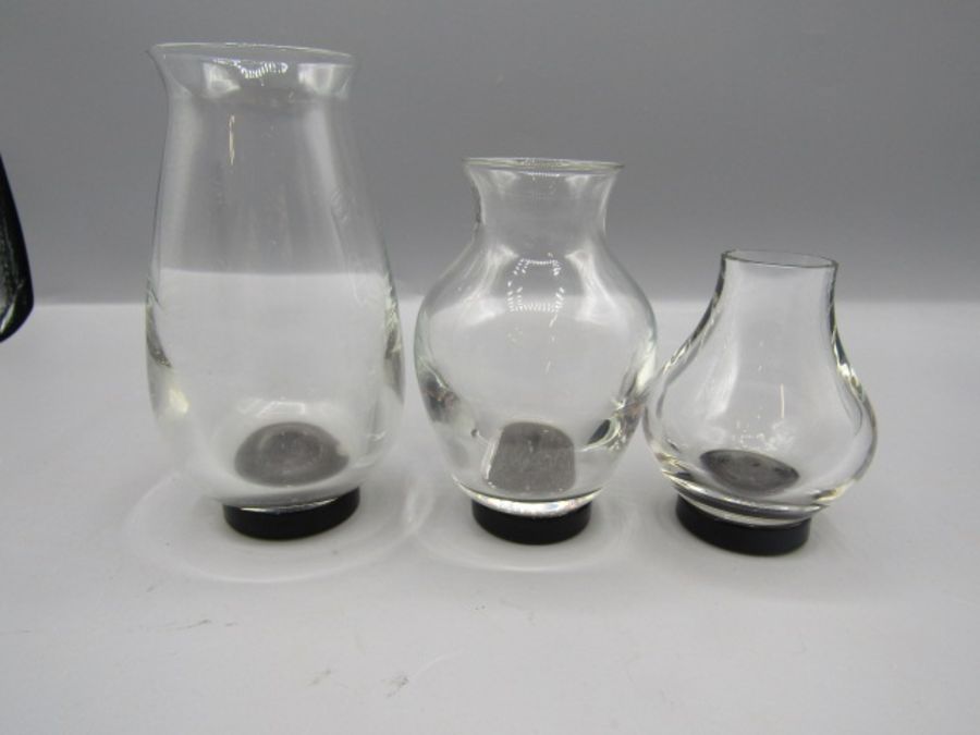 set of 3 glass vases with black base