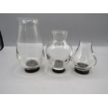 set of 3 glass vases with black base