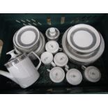 white and silver part tea set